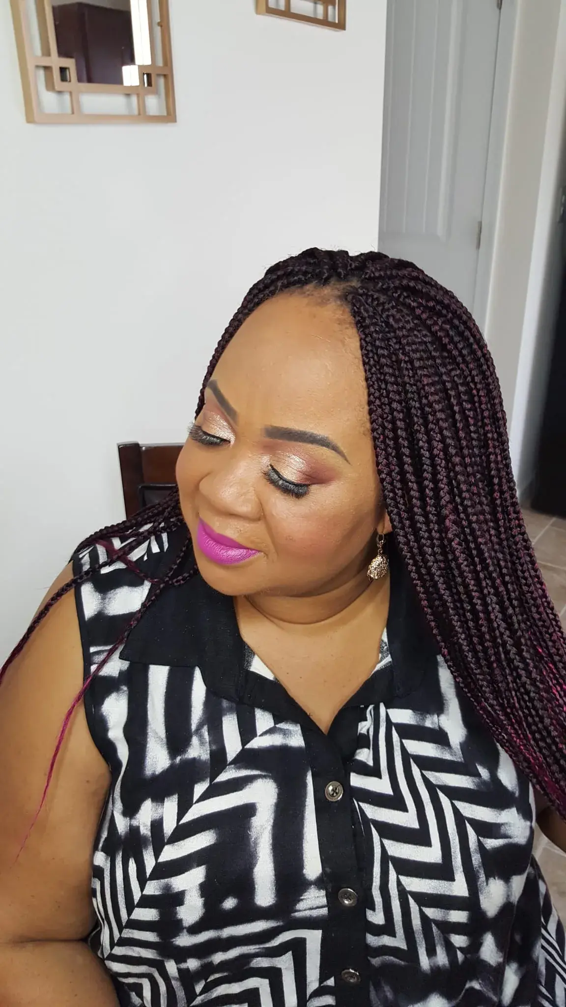 Knotless boho braids styled at Exclusive Hair Braiding in Wilmington, Delaware